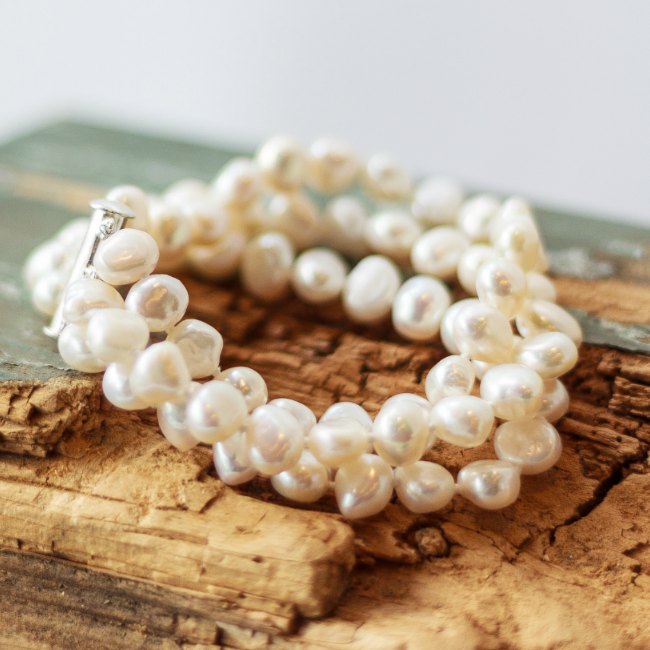 Details 165+ triple strand pearl bracelet best - kidsdream.edu.vn